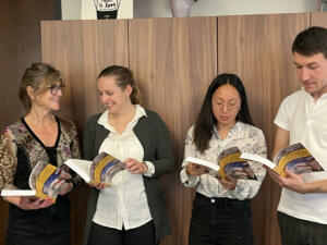 Consulate Team reading Ben's Book